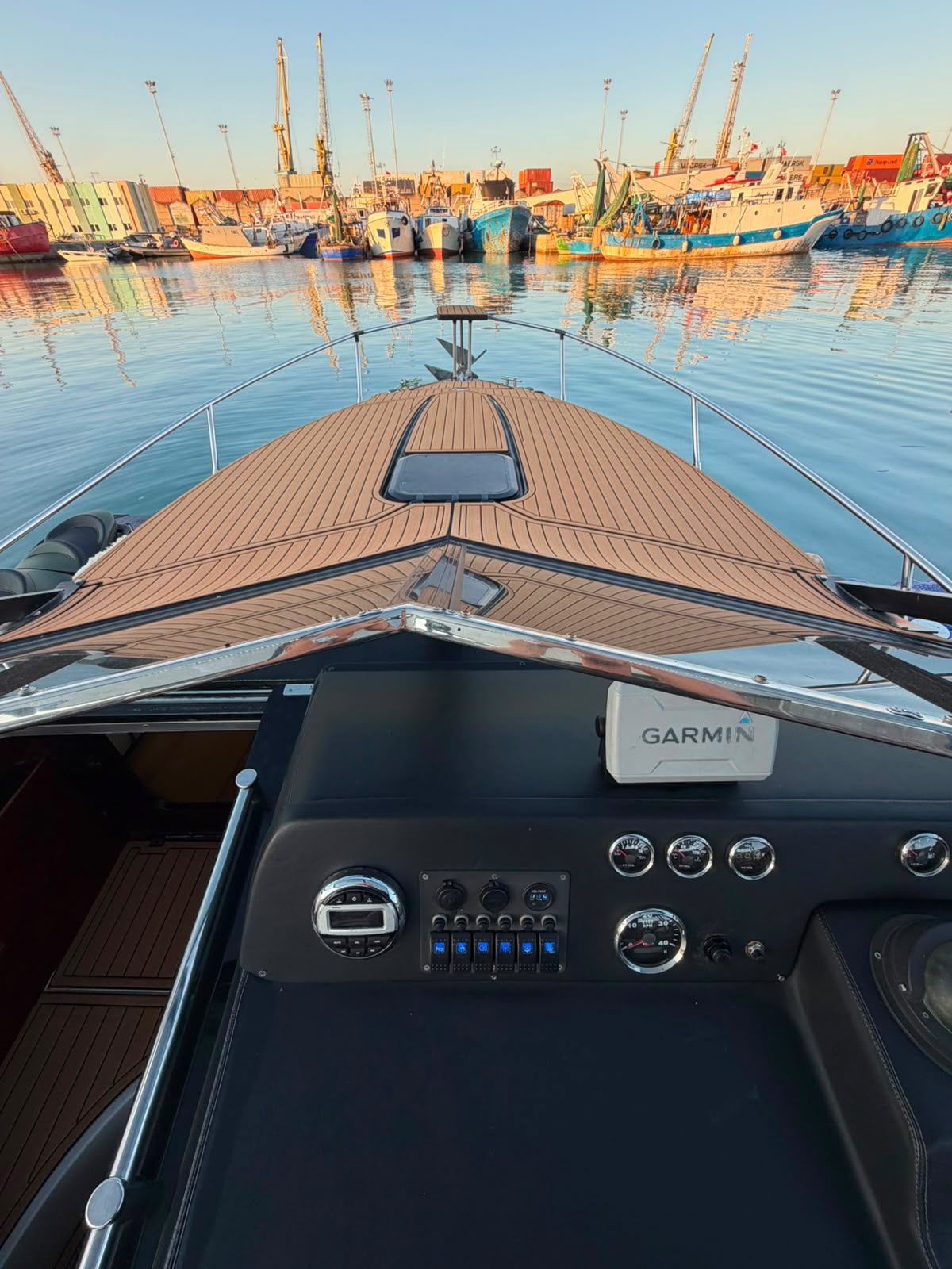 Helm with Garmin electronics looking over the bow